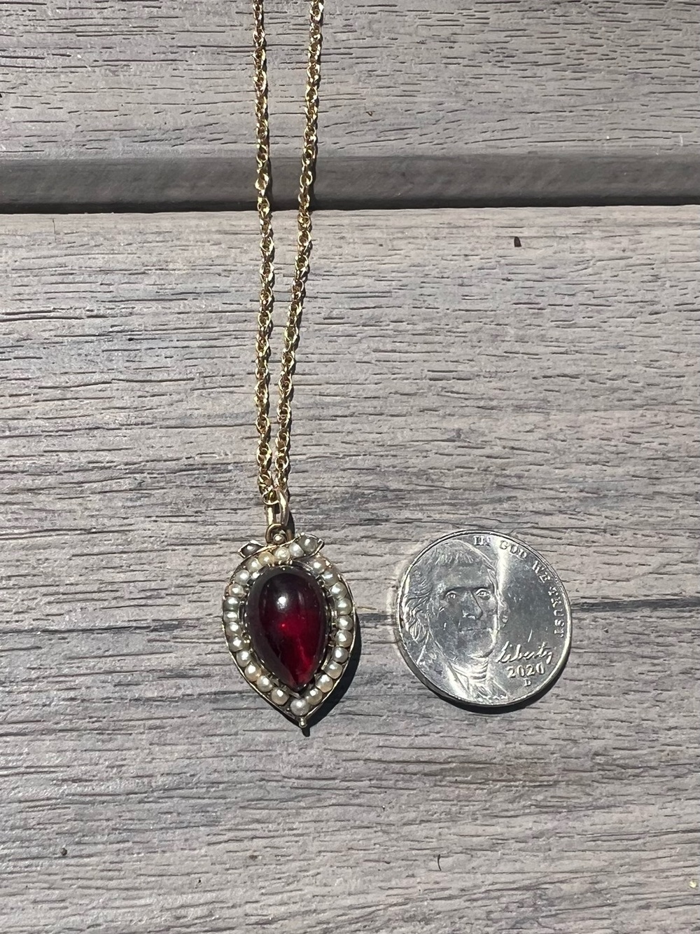 Vintage Gold-Tone Pendant Necklace with Deep Red Teardrop Stone and Pearl Halo